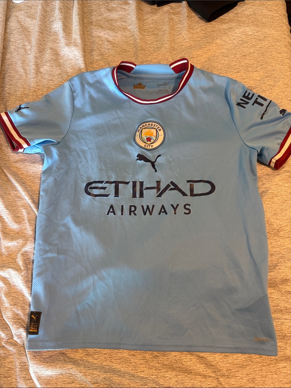 Manchester City Puma Light Blue Kids' Soccer Jersey with Maroon Trim